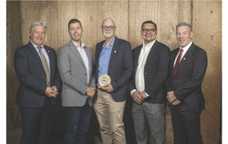 The City of Gatineau has won the Prix Génie Méritas from the Association des ingénieurs municipaux du Québec for the Constance-Provost building, home of the Lucy-Faris library in Old Aylmer. Pictured from left: Réjean Vigneault, Simon Comtois, Sébastien Landry, Joao Moreira and Philippe Côté. Photo: AIMQ