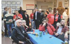 André Fortin and supporters watch the results from the October 5 general election roll in at the Knights of Columbus Hall in Aylmer. Photo: Christian Rochefort