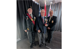 Pictured, from left to right, are Bruce Howarth (Sergeant-at-Arms), Yvan Teasdale (veteran), and Manon Gégoire (President). Photo: Petar Seslija